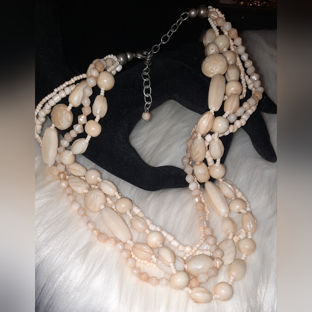 EUC carved cream colored beaded necklace adjustable length